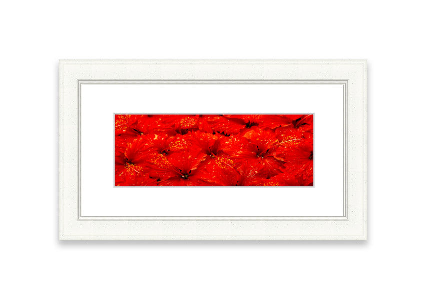 Framed print of vibrant red leaves, showcasing autumn colors, ready to hang.