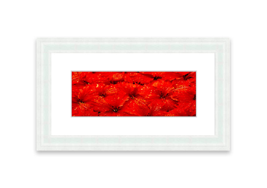 Framed print of vibrant red leaves, showcasing autumn colors, ready to hang.