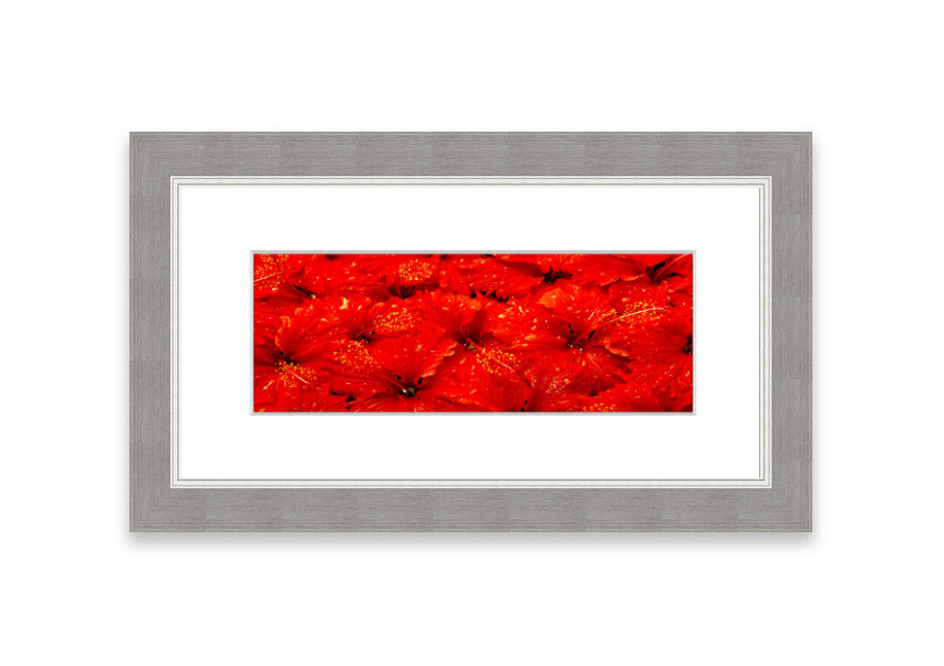 Framed print of vibrant red leaves, showcasing autumn colors, ready to hang.