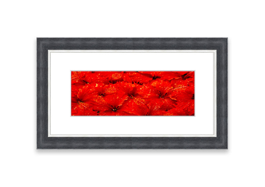 Framed print of vibrant red leaves, showcasing autumn colors, ready to hang.