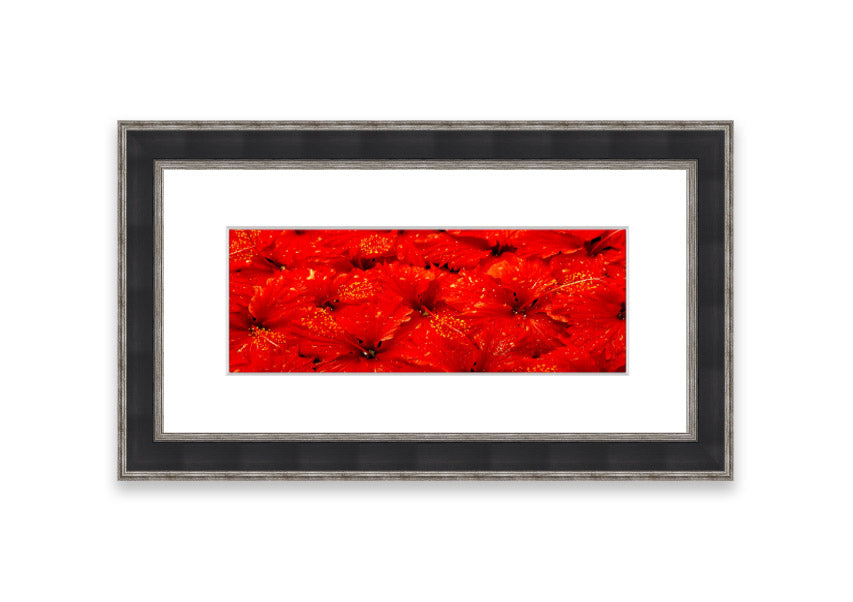 Framed print of vibrant red leaves, showcasing autumn colors, ready to hang.