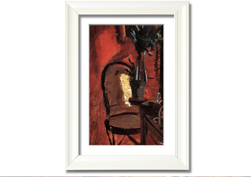 Framed print of Anna Ancher's chair artwork with a plant in front of a red wall, showcasing vibrant colors and artistic detail.