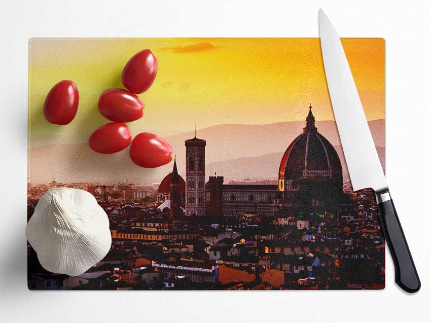 A stylish chopping board made of tempered glass featuring a chinchilla ripple effect and anti-slip feet, perfect for kitchen use.