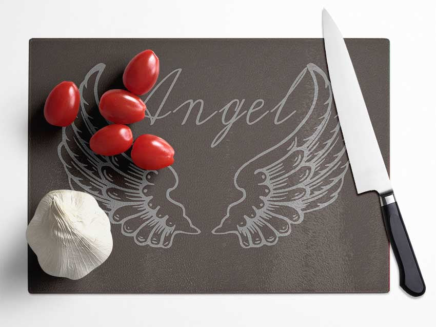 Angel Wings 4 Chocolate chopping board made of tempered glass with a chinchilla ripple effect and anti-slip feet.