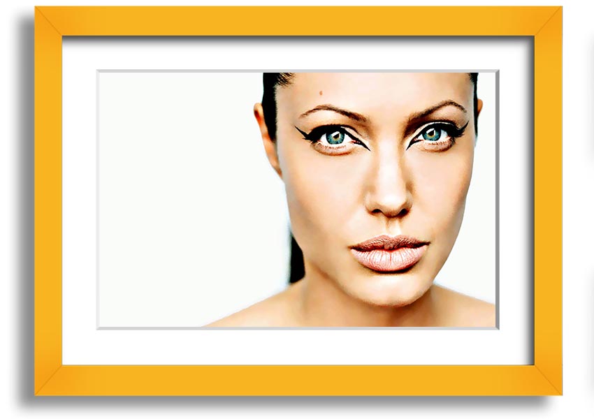 Framed print of Angelina Jolie with cat eyes, showcasing her iconic beauty in a stylish frame.