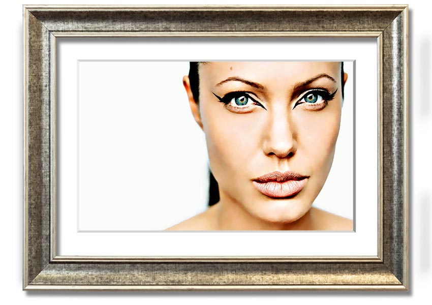 Framed print of Angelina Jolie with cat eyes, showcasing her iconic beauty in a stylish frame.