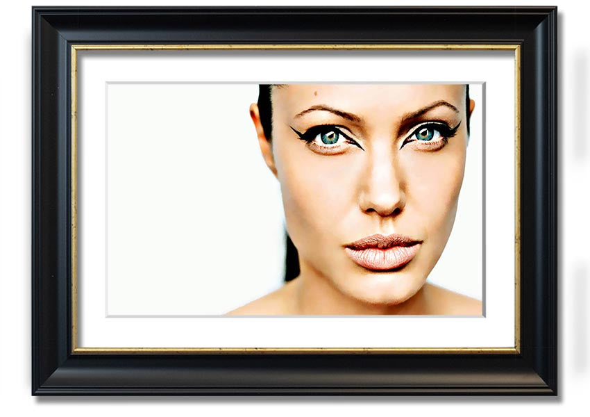 Framed print of Angelina Jolie with cat eyes, showcasing her iconic beauty in a stylish frame.
