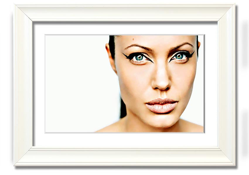 Framed print of Angelina Jolie with cat eyes, showcasing her iconic beauty in a stylish frame.