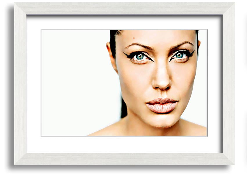 Framed print of Angelina Jolie with cat eyes, showcasing her iconic beauty in a stylish frame.
