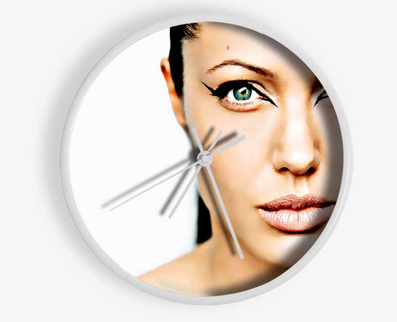 Angelina Jolie Cat Eyes clock made from natural bamboo with a round face and clear Plexiglas lens, available in black, white, and natural frame colors.