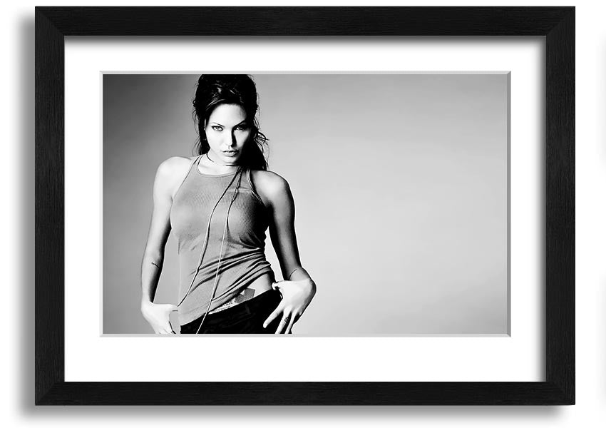 Framed black and white print of Angelina Jolie, showcasing her elegance and beauty, available in various frame colors.