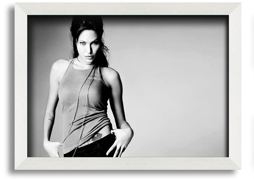 Framed black and white print of Angelina Jolie, showcasing her elegance and beauty, available in various frame colors.