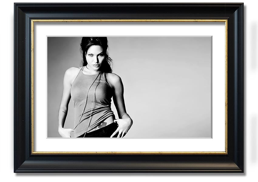Framed black and white print of Angelina Jolie, showcasing her elegance and beauty, available in various frame colors.