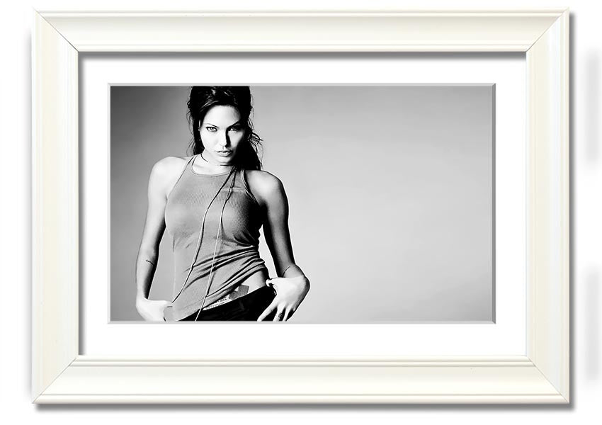 Framed black and white print of Angelina Jolie, showcasing her elegance and beauty, available in various frame colors.