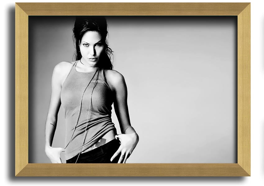 Framed black and white print of Angelina Jolie, showcasing her elegance and beauty, available in various frame colors.