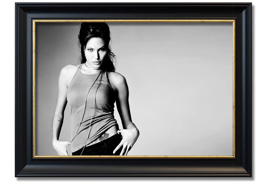 Framed black and white print of Angelina Jolie, showcasing her elegance and beauty, available in various frame colors.