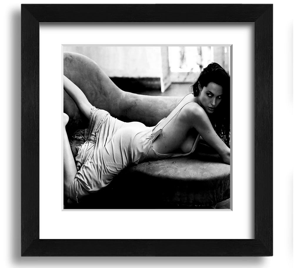 Angelina Jolie Sofa B n W square framed print, showcasing a striking black and white design, ready to hang.