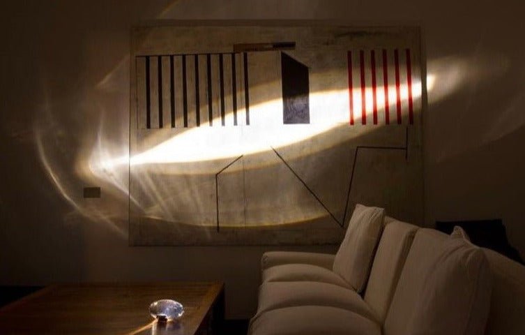 Angel's Eye Table Lamp featuring oval crystal glass and a nickel-plated base, elegantly designed for ambient lighting.