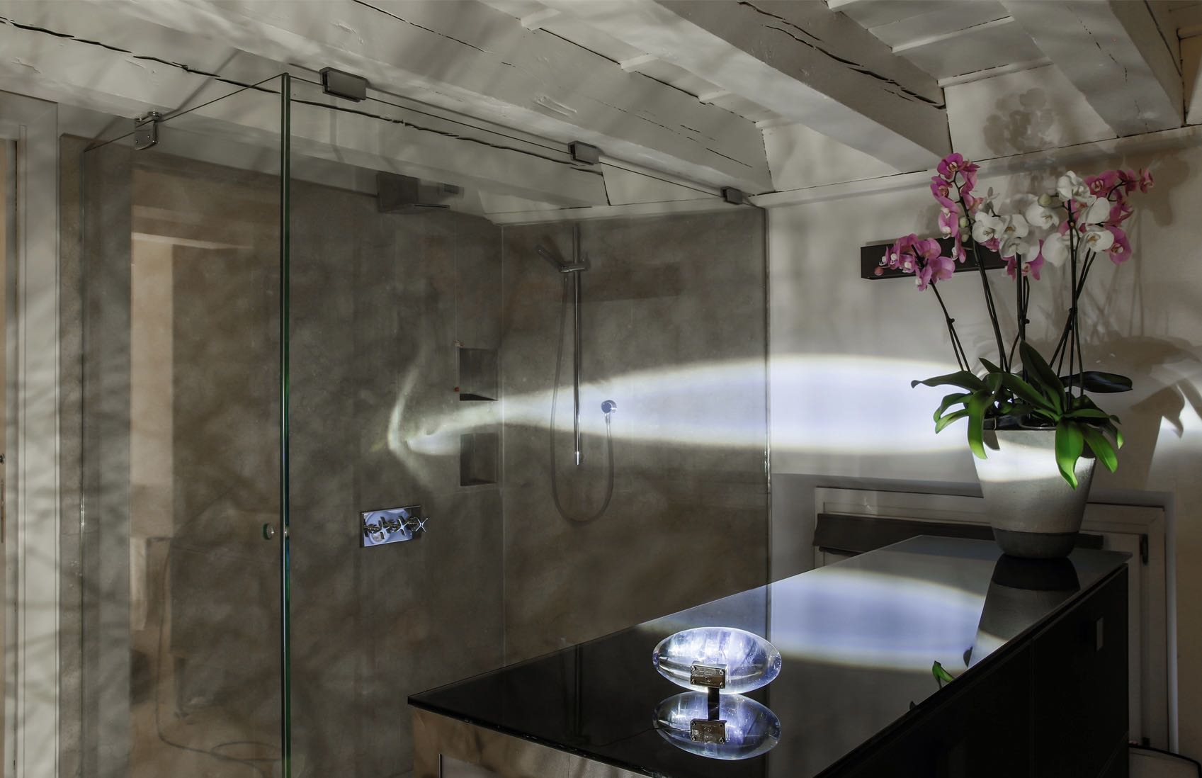 Angel's Eye Table Lamp featuring oval crystal glass and a nickel-plated base, elegantly designed for ambient lighting.