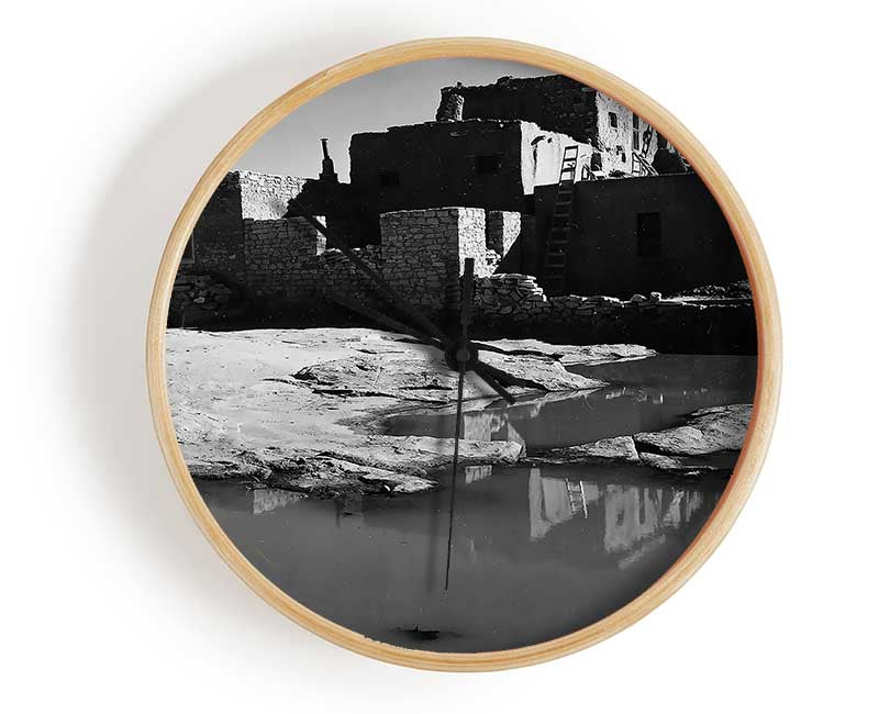 Ansel Adams Acoma Pueblo 3 clock made of natural bamboo with a round face and clear Plexiglas lens, available in black, white, and natural frame colors.