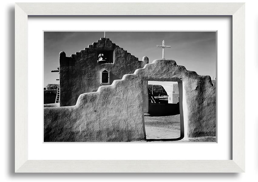 Framed print of Ansel Adams' Church in Taos Pueblo, showcasing stunning architecture and landscape.