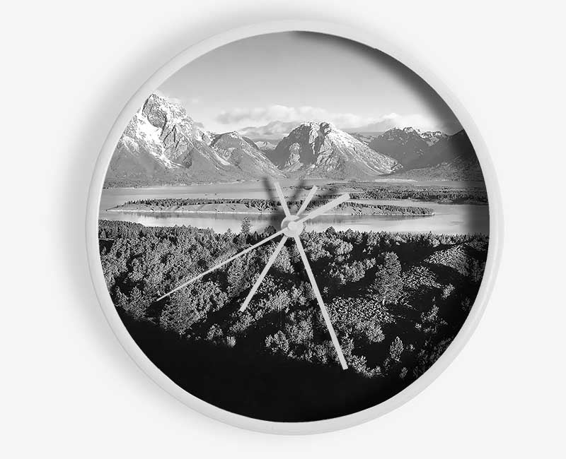 Ansel Adams Signal Hill clock made of natural bamboo with a round face, featuring black and white hands, and a clear Plexiglas lens.