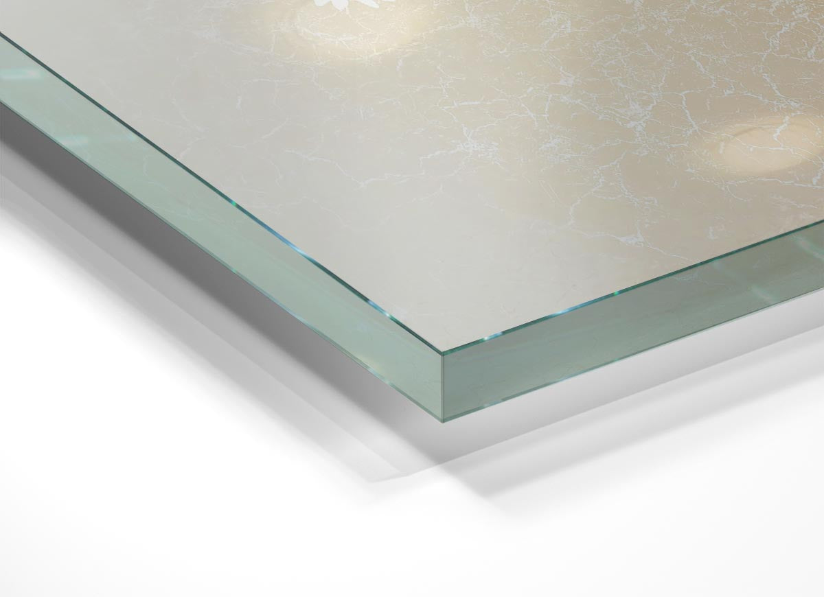 A vibrant glass print of an apple blossom tree, showcasing delicate pink flowers against a clear background, perfect for modern home decor.