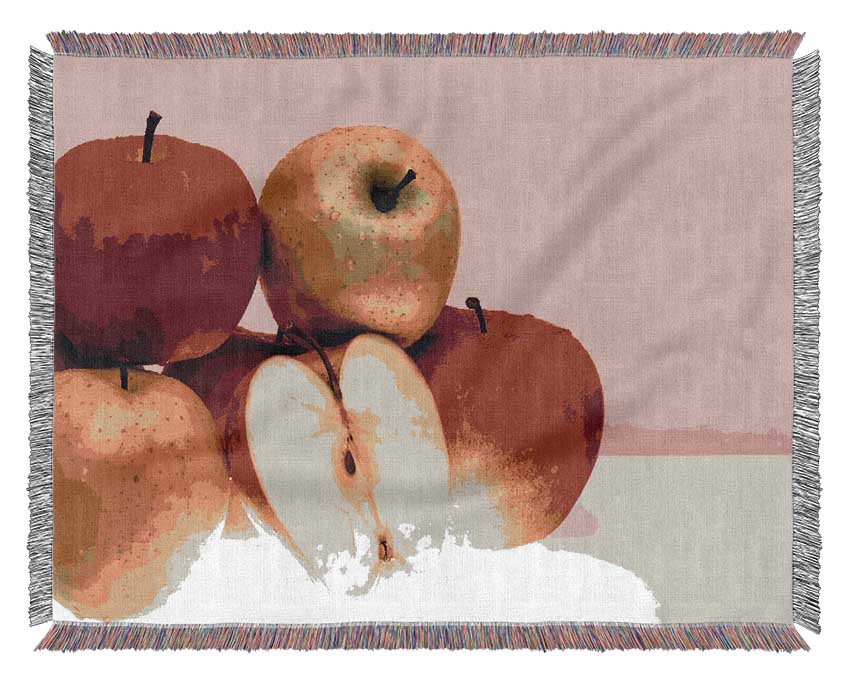 A luxurious Apple Surprise throw blanket made from 100% cotton, featuring a thermal weave for breathability, draped elegantly on a couch.