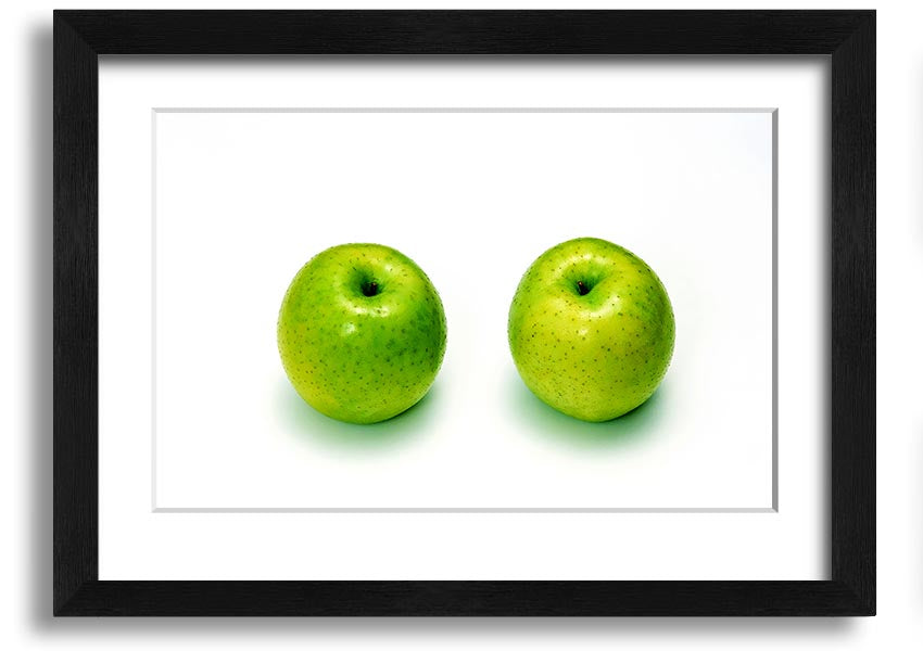 A beautifully framed print of twin apples, showcasing vibrant colors and available in various frame options.