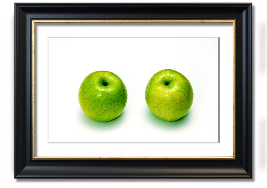 A beautifully framed print of twin apples, showcasing vibrant colors and available in various frame options.