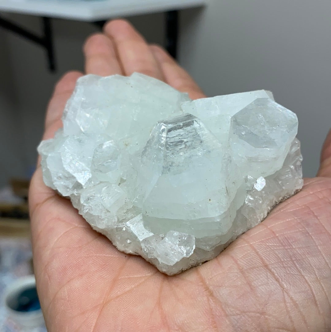 A beautiful cluster of Apophyllite and Stilbite crystals showcasing unique formations and colors, perfect for collectors and home decor.