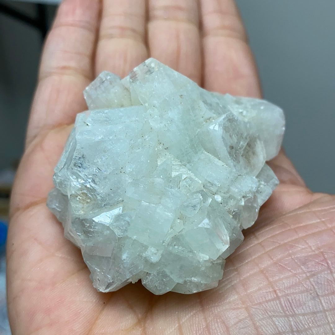 A beautiful cluster of Apophyllite and Stilbite crystals showcasing unique formations and colors, perfect for collectors and home decor.