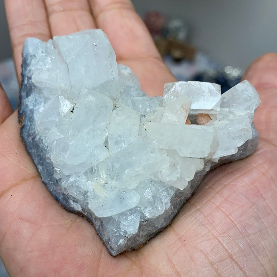 A beautiful cluster of Apophyllite and Stilbite crystals showcasing unique formations and colors, perfect for collectors and home decor.