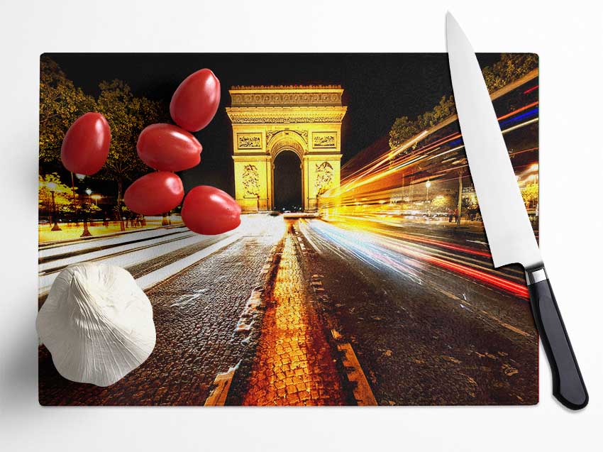 A beautifully designed tempered glass chopping board featuring the Arc De Triomphe illuminated at night, showcasing its elegant chinchilla ripple effect.