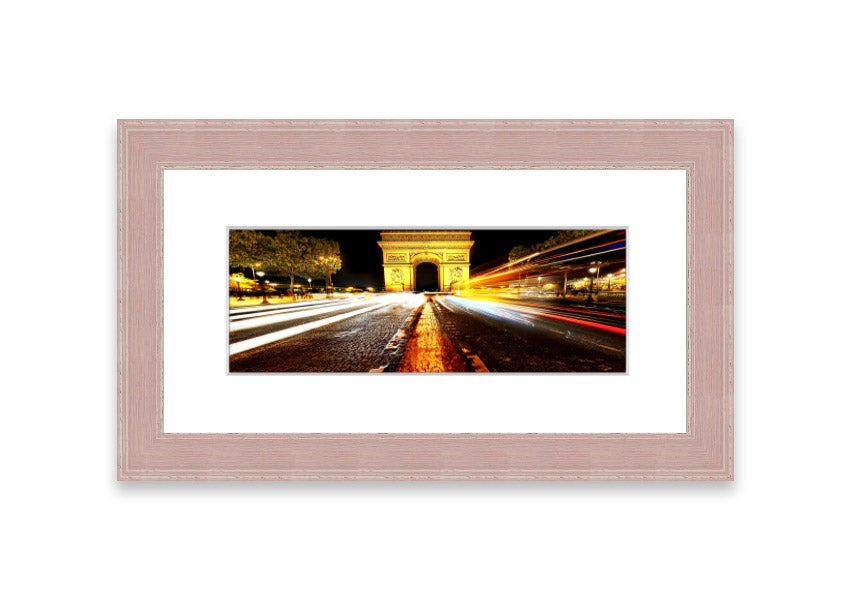 Framed print of the Arc De Triomphe illuminated at night, showcasing its architectural beauty.