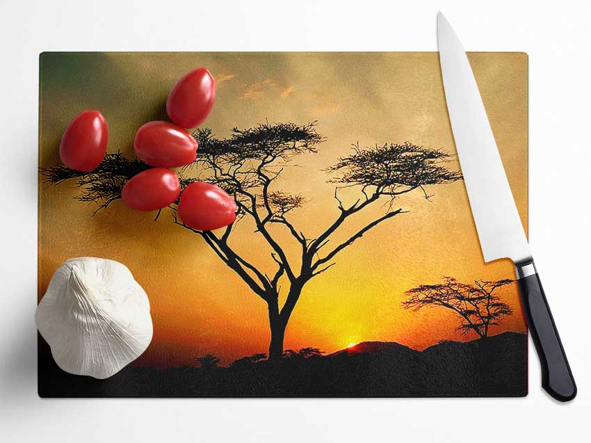 Arcania Tree Sunblaze chopping board made of tempered glass with a chinchilla ripple effect, featuring an anti-slip base.