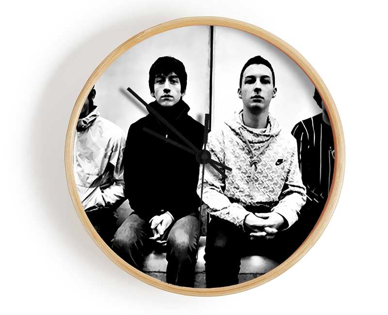 Arctic Monkeys clock made from natural bamboo with a round face, available in black, white, or natural frame colors.