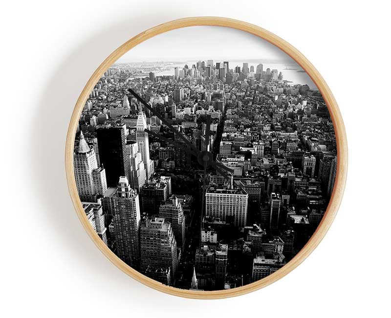 Ariel View Of Chicago B n W clock made from natural bamboo with a round face and clear Plexiglas lens, showcasing a modern design.