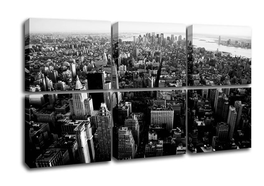 Black and white canvas art depicting an aerial view of Chicago's skyline, mounted on a box frame.