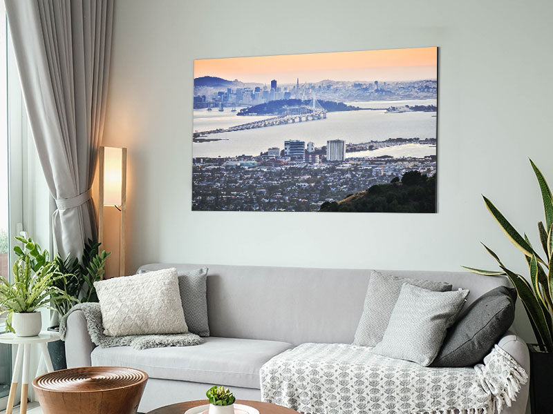 A stunning aerial view of a city printed on brushed aluminium dibond, showcasing modern art with a sleek finish.