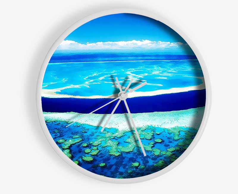 A stylish bamboo wall clock featuring an Ariel view of the turquoise ocean, perfect for home decor.