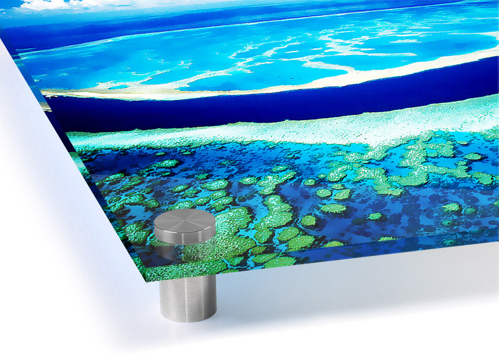 Aerial view of a turquoise ocean printed on acrylic glass, showcasing vibrant colors and serene waves.
