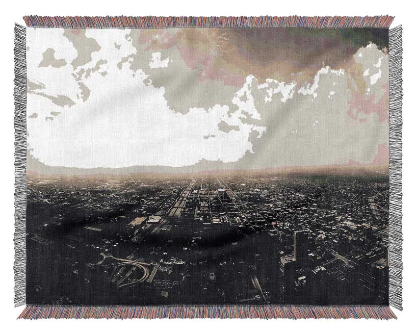 A luxurious 100% cotton throw blanket with a thermal weave, elegantly draped over a couch, showcasing its breathable and soft texture.