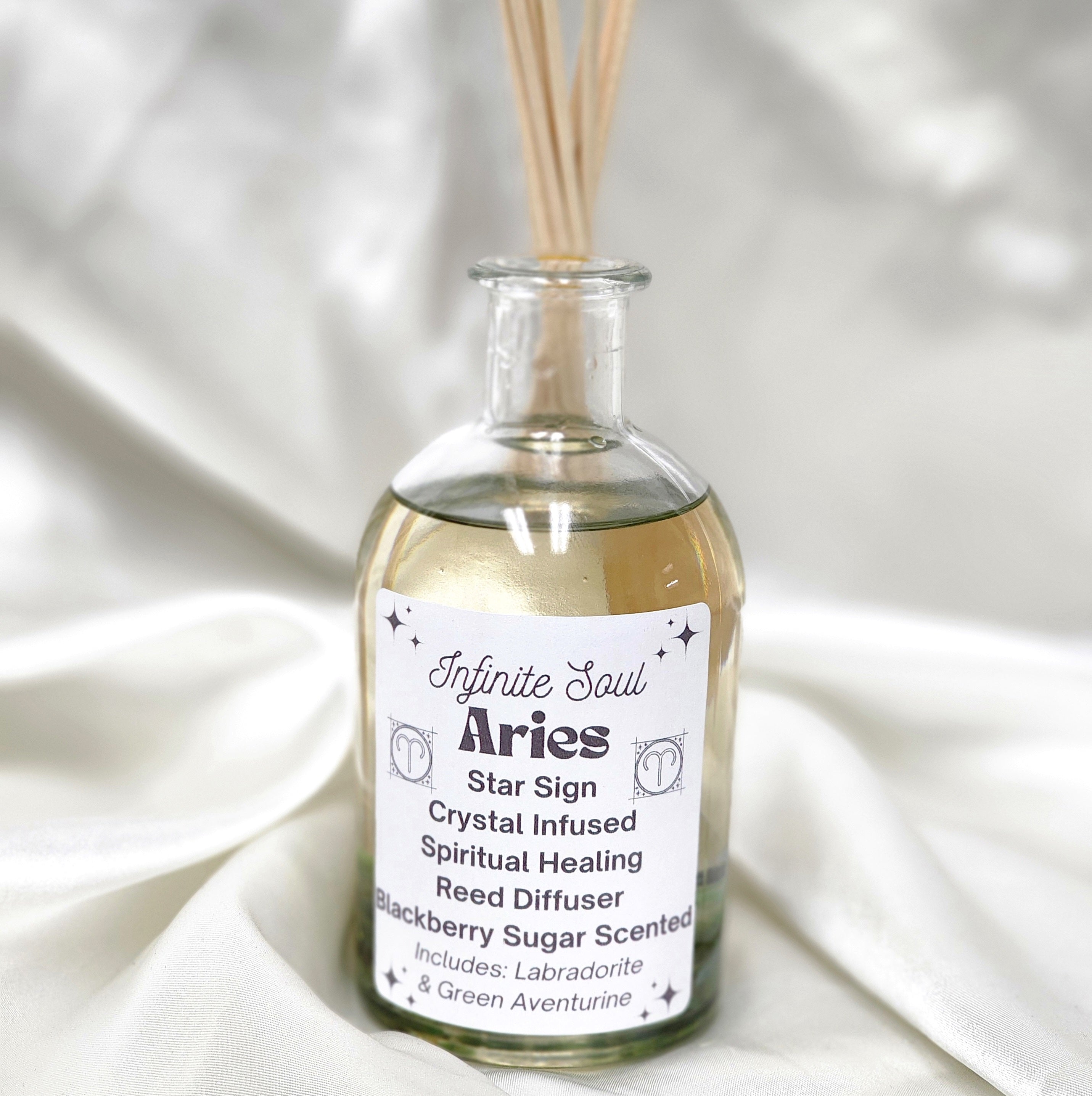 Aries Star Sign Crystal Infused Reed Diffuser with Blackberry Sugar scent, featuring natural reeds and infused crystals for a soothing aroma.