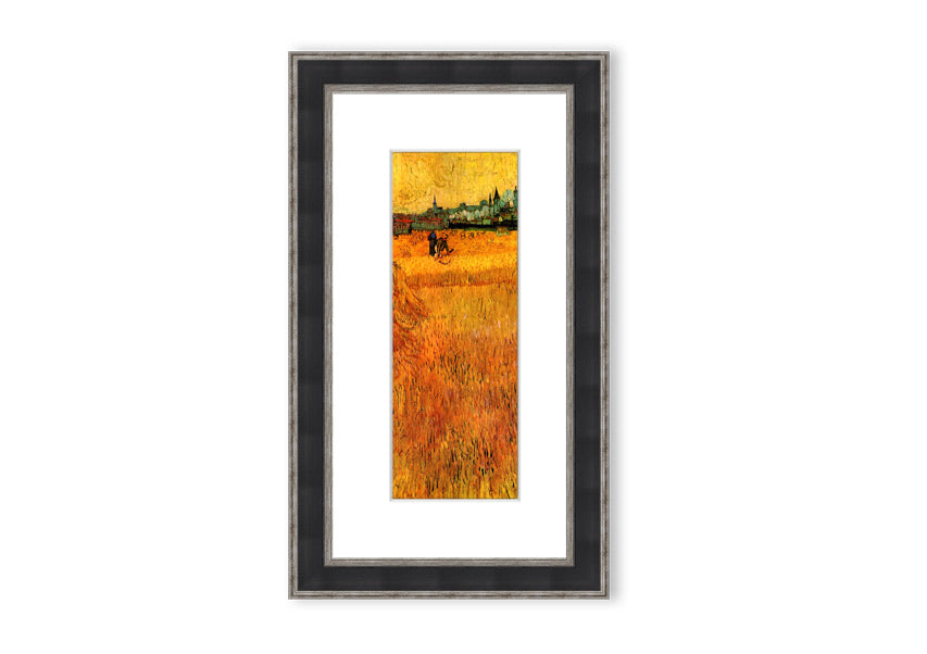 Framed print of Van Gogh's Arles View From The Wheat Fields, showcasing vibrant colors and dynamic brush strokes.