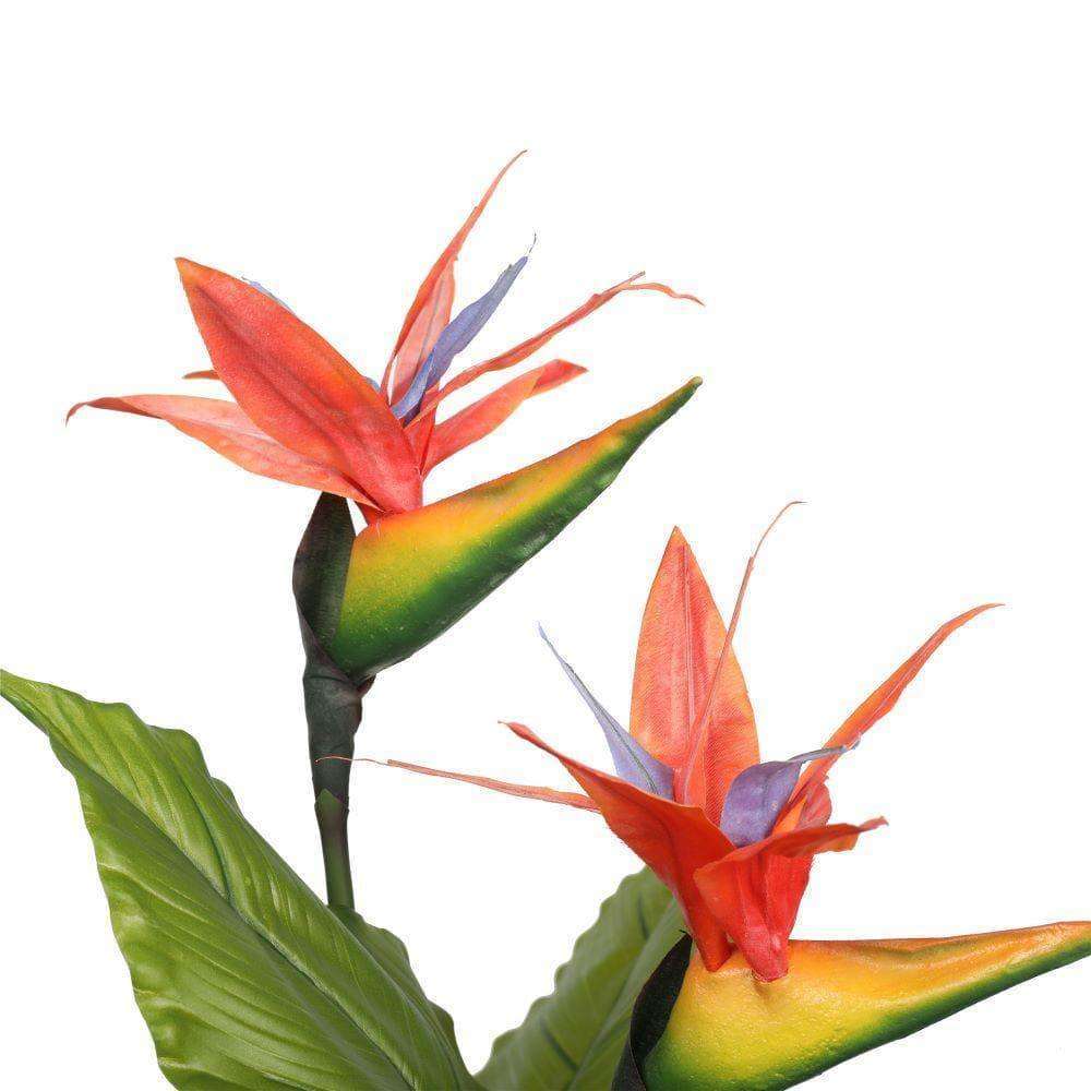 A 110cm tall Artificial Bird of Paradise Plant in a decorative pot, showcasing vibrant green leaves and a realistic design.