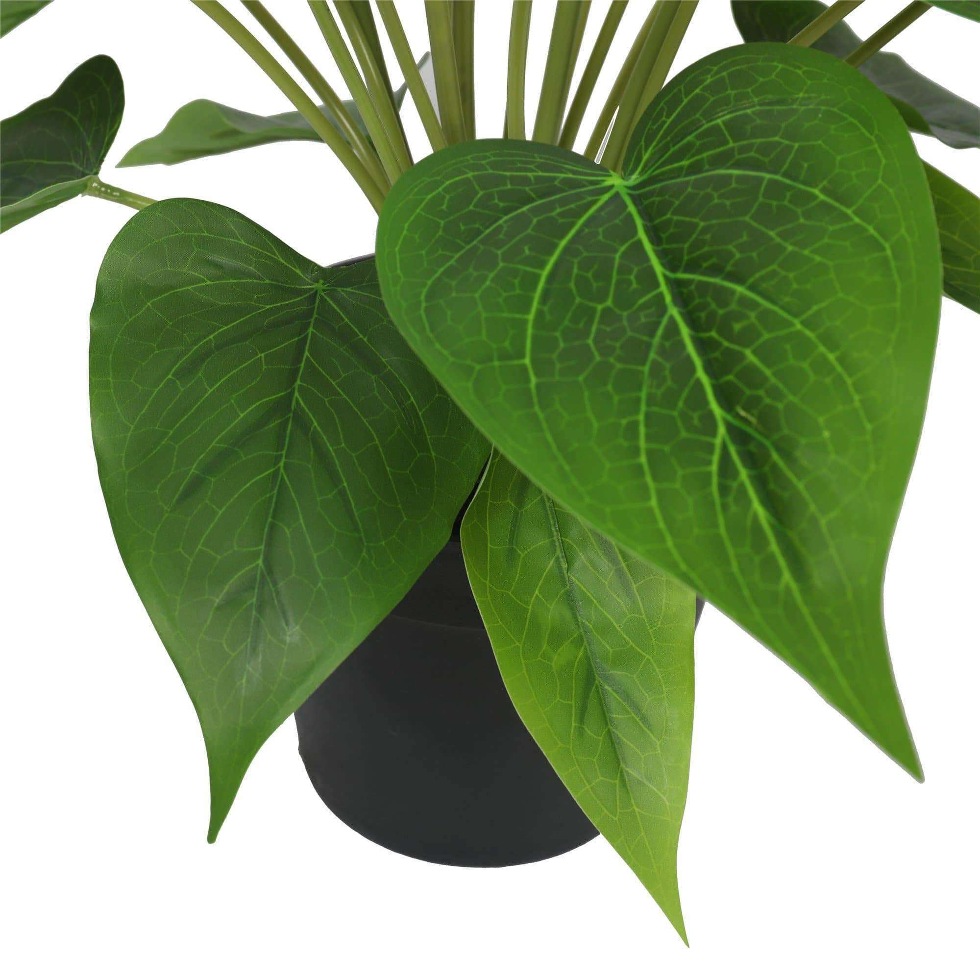 Artificial Flowering White & Pink Peace Lily in a decorative black pot, showcasing realistic pink and white flowers.