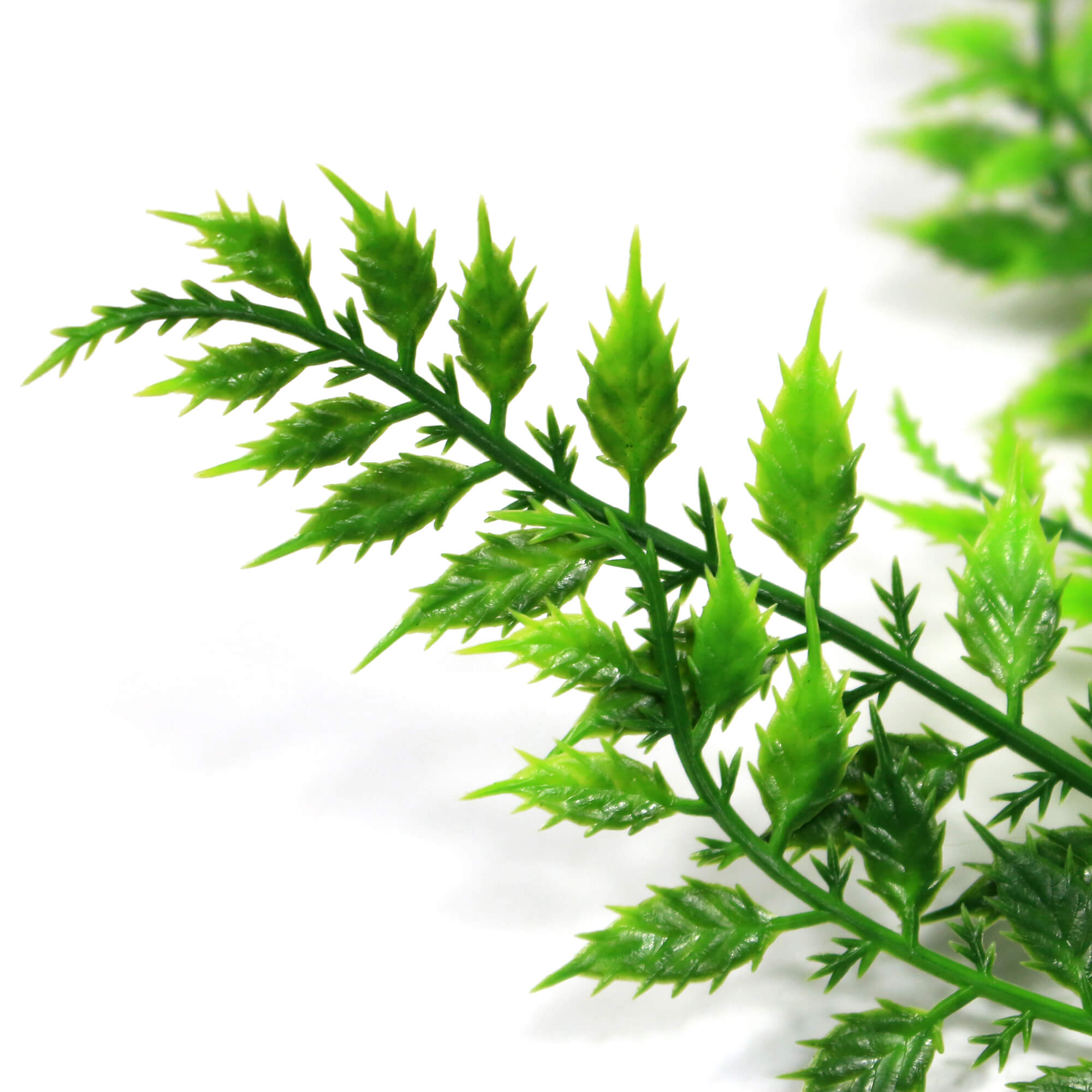 A vibrant 30cm Artificial Mediterranean Stem with four branches, showcasing realistic leaves and flowers, perfect for indoor and outdoor decor.