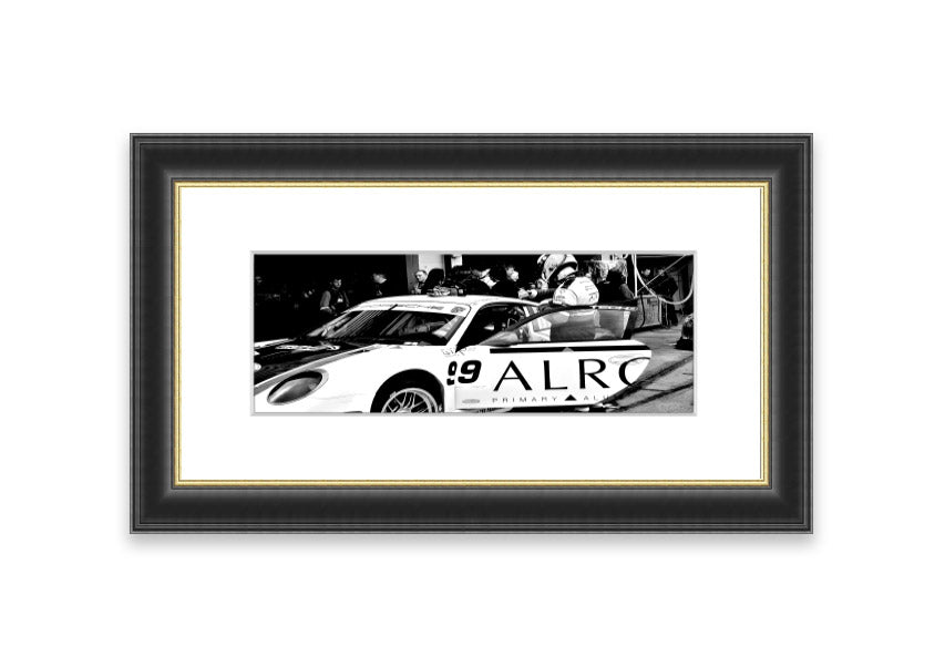 Framed print of Arton Senna preparing for a race, showcasing vibrant colors and detailed craftsmanship.