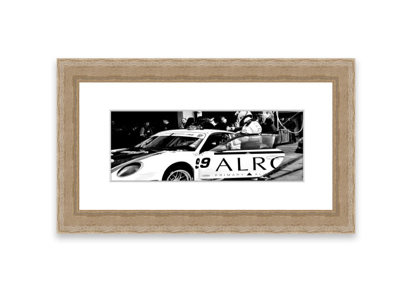 Framed print of Arton Senna preparing for a race, showcasing vibrant colors and detailed craftsmanship.